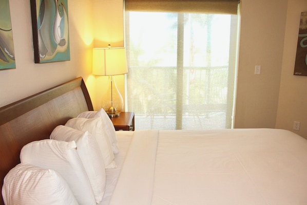 Master bedroom with access to the balcony