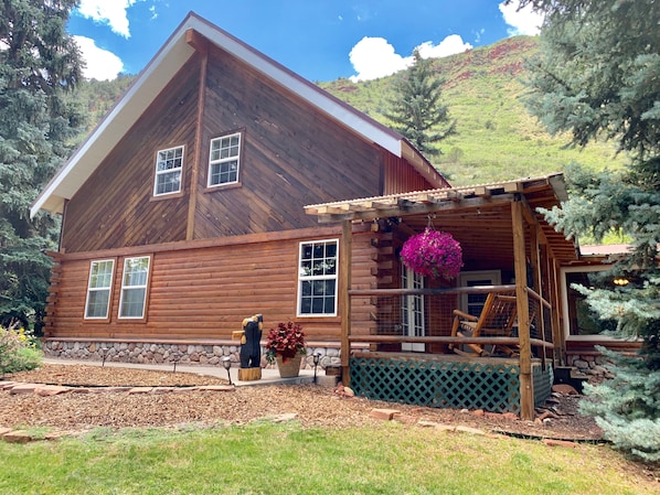 Beautiful house across from the river with beautiful outdoor spaces to enjoy