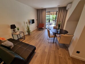 living room, entrance to the apartment