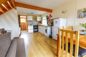 Open plan kitchen and dining area. Fully fitted kitchen with washing machine etc
