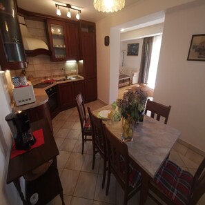 Kitchen area. Kitchen + dining area