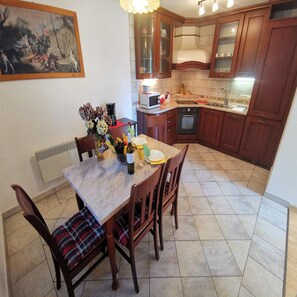 Kitchen area. Kitchen + dining area