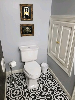 Hall half bath off the living room.