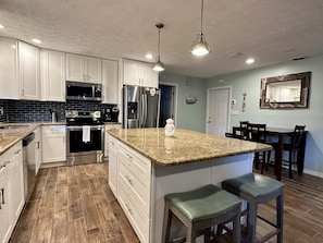 Completely updated WIDE open kitchen with plenty of space on the island!