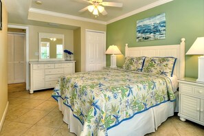 Spacious bedroom with a flat screen TV