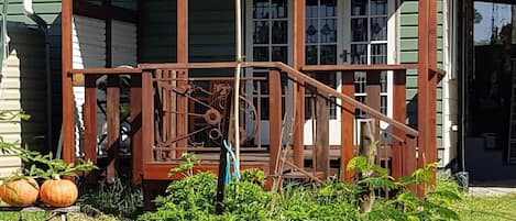 The deck overlooks the garden and is a great spot to catch the morning sun. 