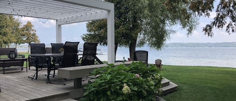 Large private deck with outdoor seating and eating area
