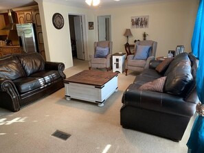 RECENTLY UPDATED FURNITURE TO ALLOW FOR MORE SEATING IN OPEN LIVING ROOM
