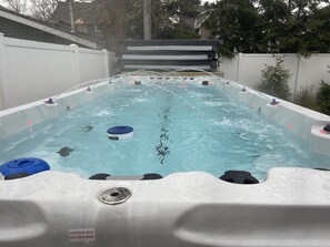 Salt water Swim spa 8 feet by 20 feet open all year round 