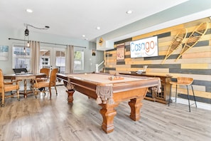 Our game room is amazing with pool, poker, smart TV and kitchenette that leads to the lower deck outdoor dining and gathering areas.