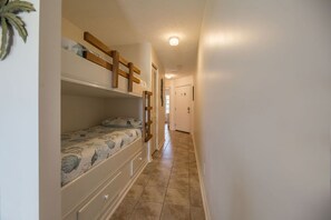 Twin size bunk beds in the hall. Littles will love them!