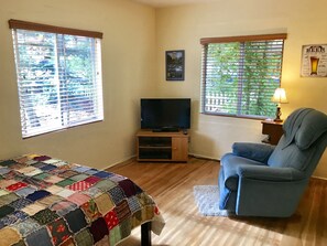 Bedroom 2: Full bed, recliner, TV