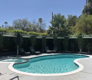 California misters cool the air around the pool by 20 degrees in the summer!