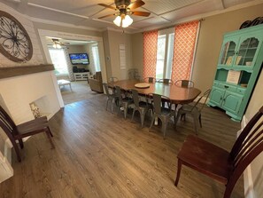 Dining room is the hub of the house, open to the kitchen and living room.