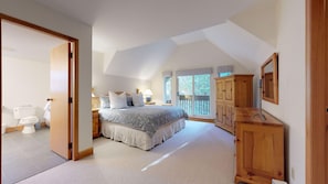 Top floor primary bedroom w/ king bed and juliet balcony