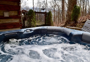 Soak your cares away in the four-person hot tub!