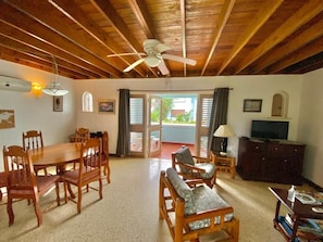 Spacious living and dining which opens out to a beachfront patio