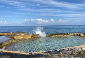 Rock pool filled by the Caribbean Sea