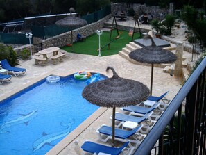 View of the pool area from the balcony of bedroom 2