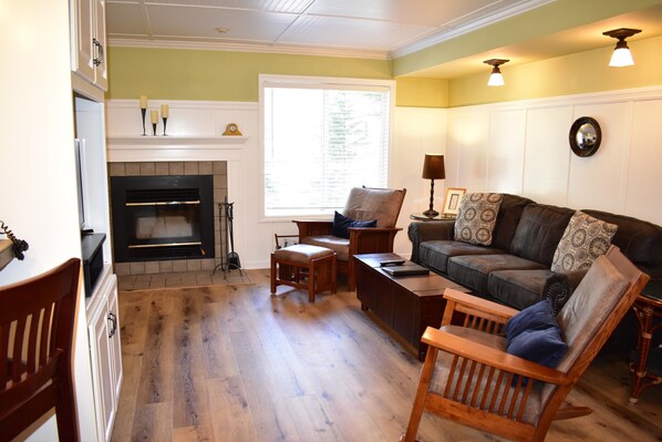 Living room with sleeper sofa and fireplace