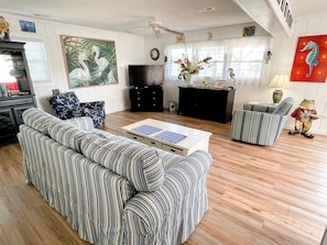 Living Area with Queen Sleeper Sofa, TVDVD, Deck Access