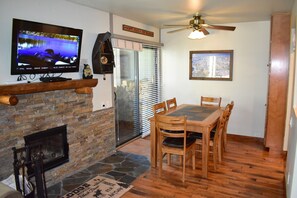 Dining table, bar area has additional seating