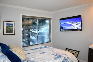 Bedroom with flat screen and sink area