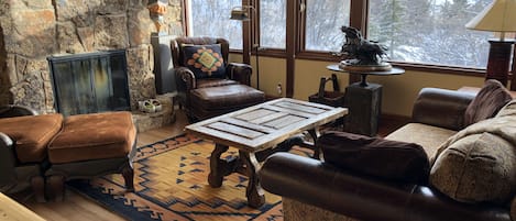 Living Room With Mountain Views and Fireplace