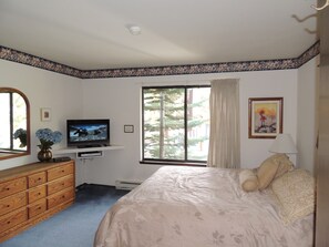Master bedroom with a king bed