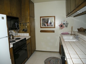 Kitchen with tile countertops