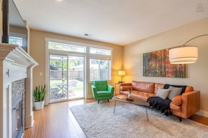 Living room opens up to the back yard