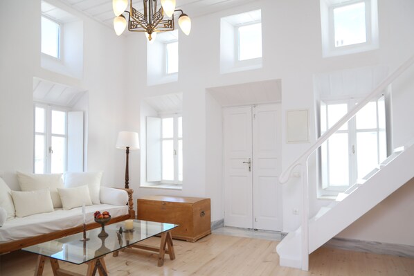 Living room and staircase to upper floor