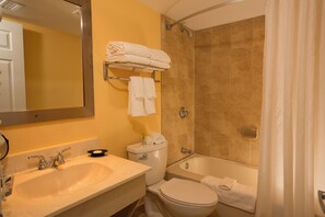 Full bathroom with a shower and tub, with all the essentials, towels provided!