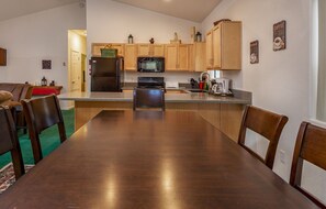 There's plenty of room for enjoying meals at the spacious dining room table.