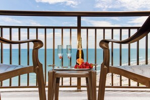 Enjoy the fresh air and sunshine in this cozy balcony oasis!