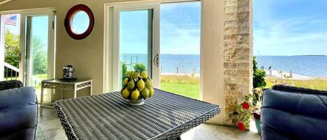 Morning coffee or sunset drinks - dine alfresco right on the water