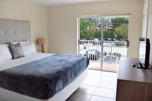 Bedroom with a King size bed and flat screen TV