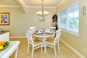 Dining area with a table for 4 guests