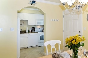 Dining area with a table for 4 guests