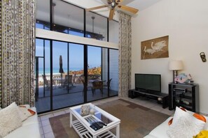 Living Room with beach view and 50' TV & Bose sound system