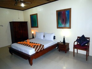 Barley Room with a queen sized teak bed.
