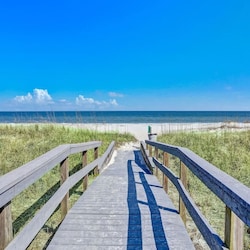 Boardwalk from the pool area to the beach