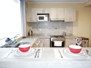 Fully equiped Kitchen. (1st floor).