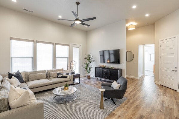 Living Room View - The Living Room is conveniently located adjacent to the Kitchen and Dining Table and is a great place for entertaining guests during downtime.