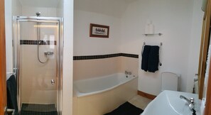 Bathroom with walk in shower.