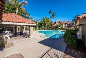 A bbq area for Hot tub & pool side party days, steps away from condo