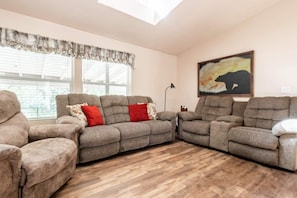 Our front room makes family time special.  Open ceiling light is wonderful.