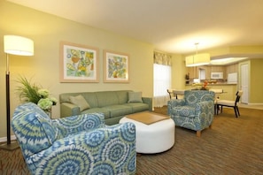 Nicely decorated living room, with a pull out sofa bed for sleeping!