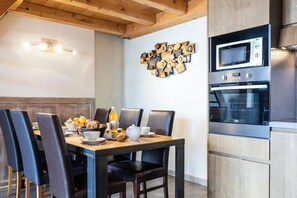 Enjoy a delicious meal at the dining table.