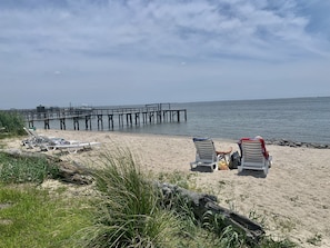 Guests can enjoy their own private beach on the property to work on their tan!